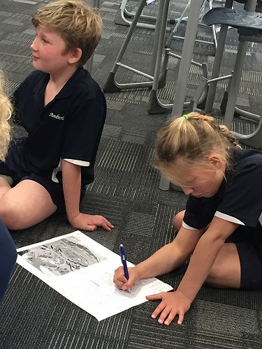 Jasmine adding ideas to her and Lucca's brainstorm.