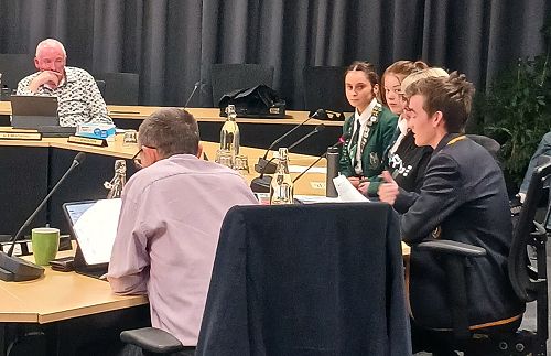 Reid Penwarden (John McGlashan) speaking at the DCC Council Chambers