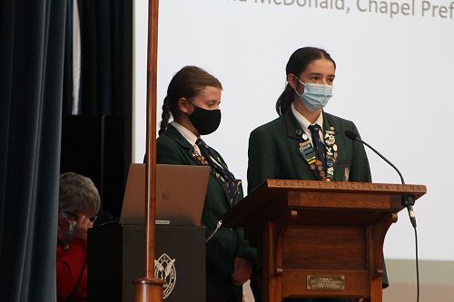 Emma McDonald and Elyse Davey lead us in an opening prayer