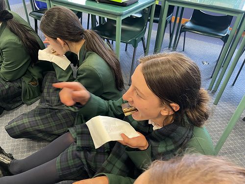 Sienna Baker tasting her creation