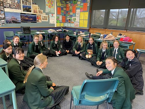 The class relived childhood sitting on the class 'mat'