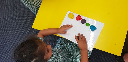 Mixing colours with playdough