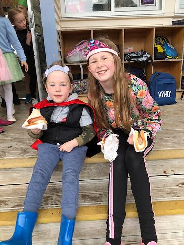 The guards on the deck eating their sausages
