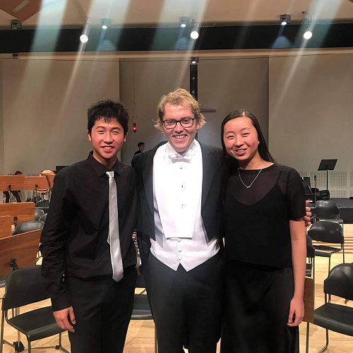 Matthew Chanwai, Mr Carpeneter and Emily Jin at the NZSSO