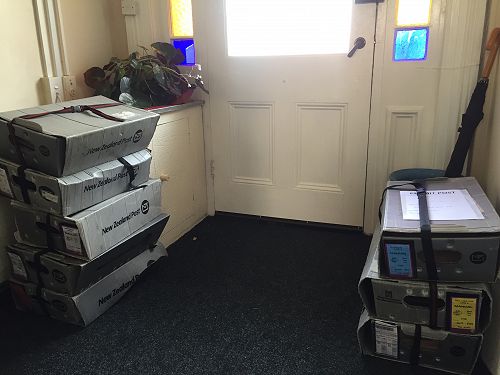 Some of the boxes of magazine packed ready for collection by courier.