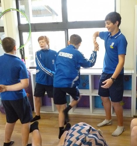 Sharing some interesting dance moves - perhaps practicing for graduation