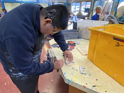 Prabvir designing his name board at Hard Tech