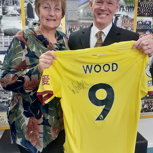 Julie Wood and Mr Groom snapped with gift