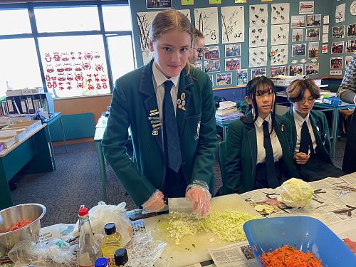 Charli Sinclair making wontons
