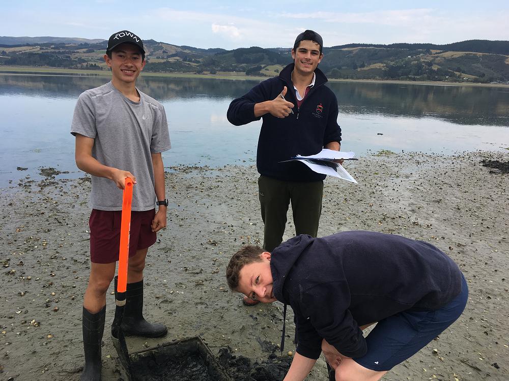 Josh, Angus & Eli sampling the mudflat community