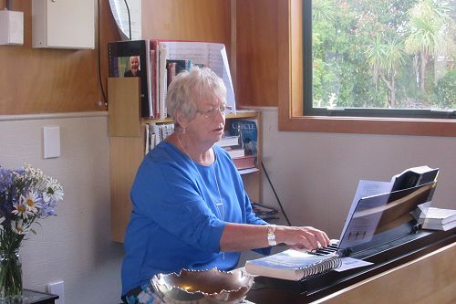 Noeline Adam at her usual place, playing the organ and making music at Te Anau’s St Michael and All Angels Church, at her last service there. 