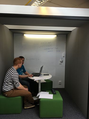 Room in a room concept- whiteboard on back wall great for brainstorming and sharing ideas