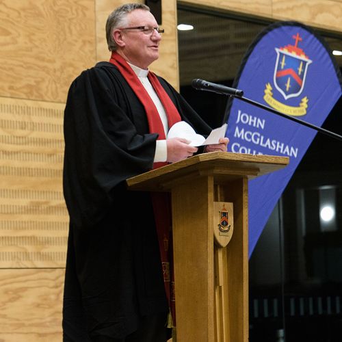 Rev Barry Kelk blesses the senior prize-giving