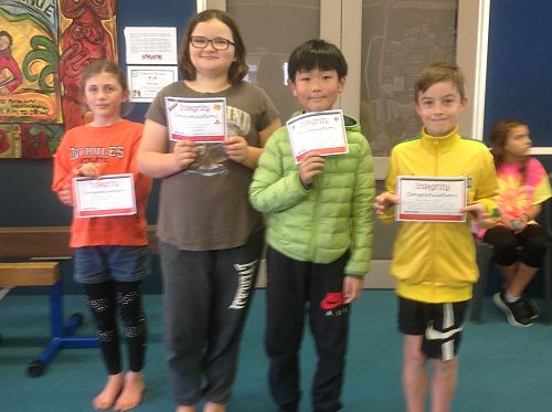Integrity awards for Olivia, Mackenzie, Leo and Saxon.
