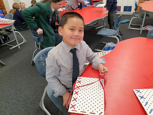 Dylan is very proud of his stitching work