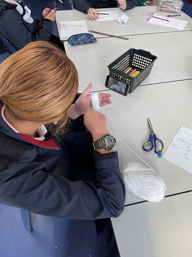 Using a YouTube clip to learn new skills.