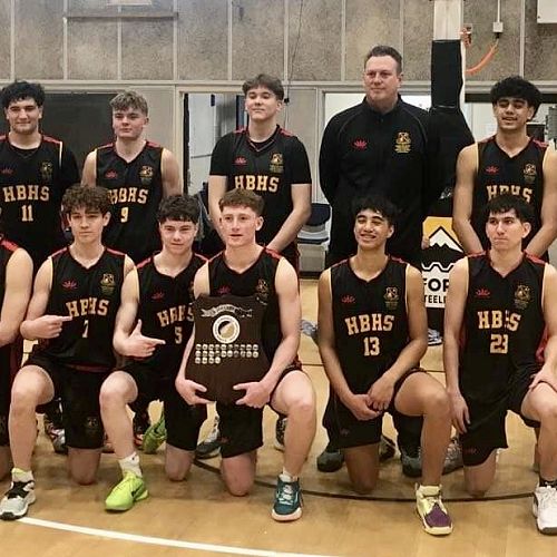 Our champion Super 8 Basketball team, with coach Mr Riki Strother