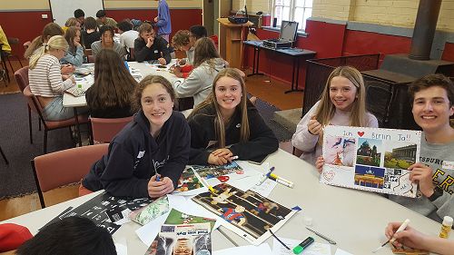 Elloise Cameron, Brenna Lyons and Zara Radel making posters