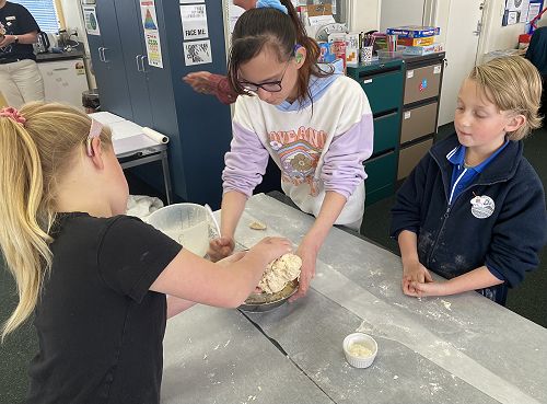 Peyton, Starlette and Billy making dough