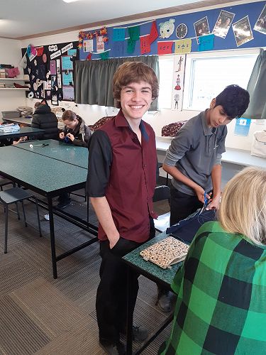 Jacob and Vipin completely changed the look of this shirt by swapping out the existing long, burgundy sleeves for short black ones.  