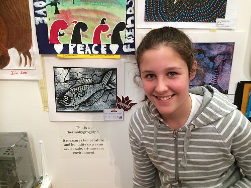 Jess beside her winning print