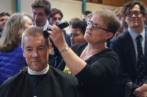 Mrs Calverley (the one who started it all!) takes the first layer off Mr Reddiex