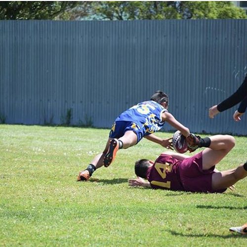 Orlando Tuhega-Vaitupu 7Mbe dives over to score a fantastic try for the Otago touch team. 