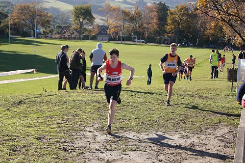 Daniel and Callum climb to the finishing straight of the Y9&10 cross country