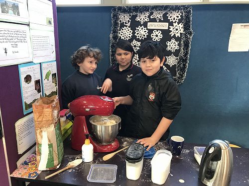 Magnus, Lukas and Levi getting the dough started. 