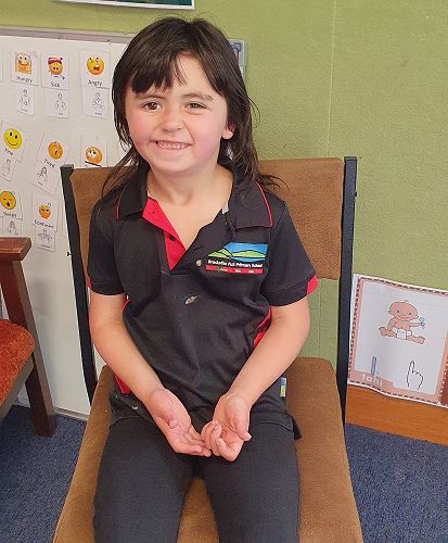 Harper is excited to have a new hearing device.