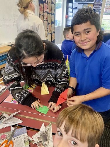 Rio Nakamura sharing Japanese culture and teaching origami at St Joseph's Pleasant Point