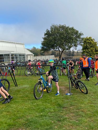 Thomas Graham waiting to be tagged in to begin the bike leg of the course