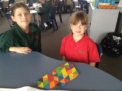 Claudia & Taylor making tessellating patterns