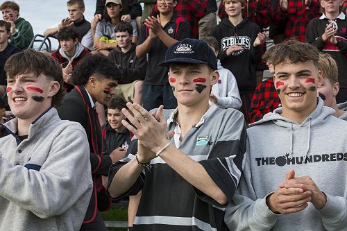Support: The closely-fought game drew a big crowd of students and parents.
