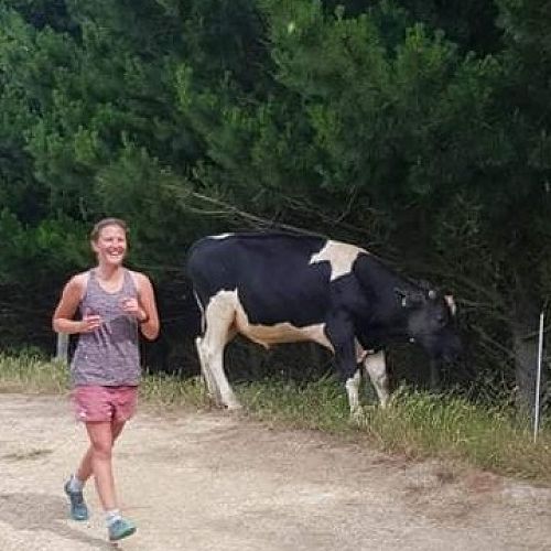 Laura running on her farm, training for the Pauanui event.