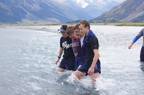 Danny, Alex, Nathan and Ben practising their river crossing technique