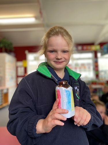 Tayla Austin showed to her class how to use her creation for playing Colour Eye-Spy