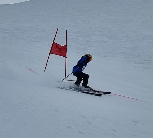 Jack Templeton takes a gate on his way down Mt Dobson. 