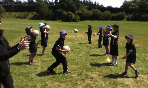 Netball - Practising their throwing skills.
