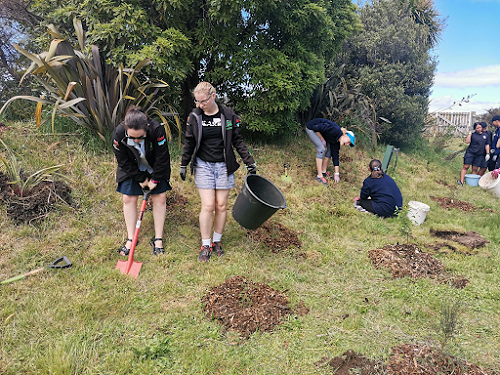 India and Katherine planting as a part of the Climate Change workshop.
