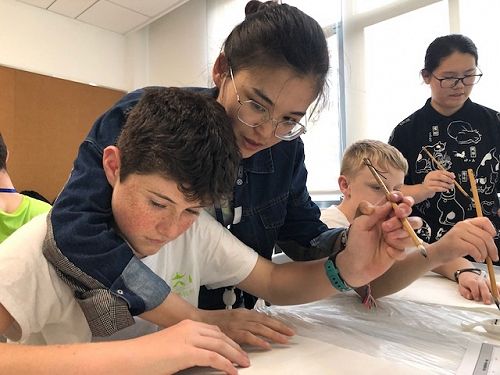 Rhys learning Chinese Calligraphy