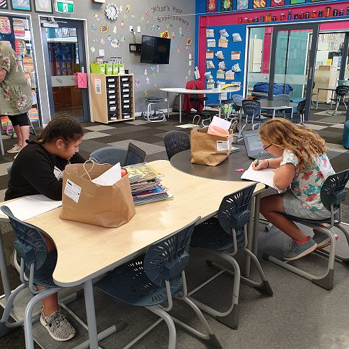 The girls busy on their school work