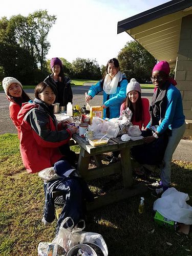 Cooking an appetising dinner on Saturday evening. (l-r)
Monica Kim, Sua Oh, Grace Louie, Joy Louie, Hope Louie and Zemirah Koiki.

