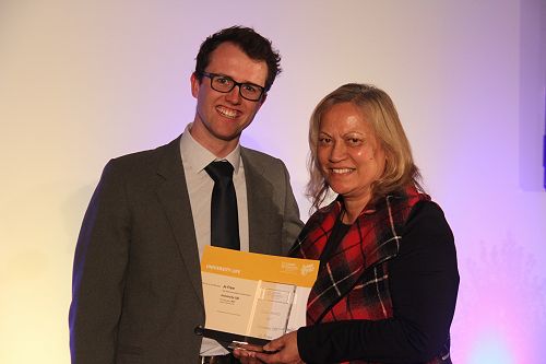 Danyon Thomas present Jo Frew with her Gold Award for University Life