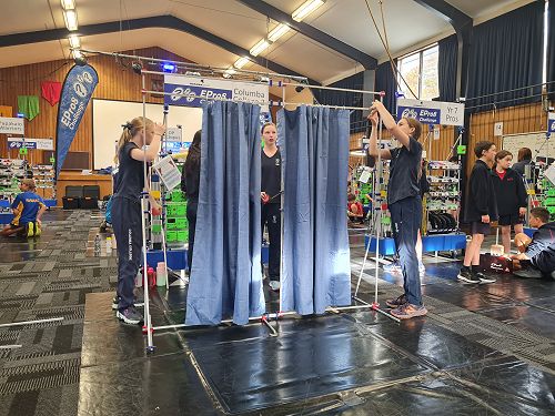 Putting up the curtains