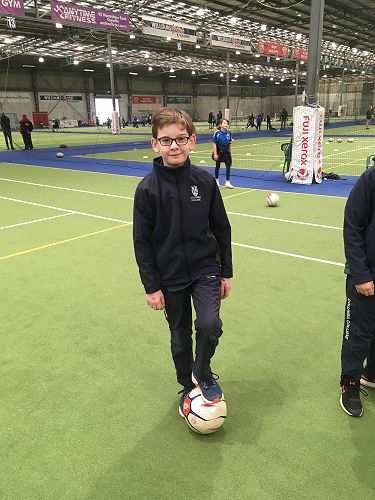 Harry Bird participating in the soccer skills session.
