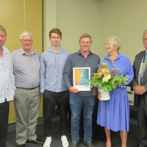 ( Left) Members of Noeline Adam's  family, son Peter, husband Ken, grandsons Thomas  and Cameron , Noeline and  SDC Mayor Gary Tong on the occasion of Noeline receiving SDC Community Service Award. 