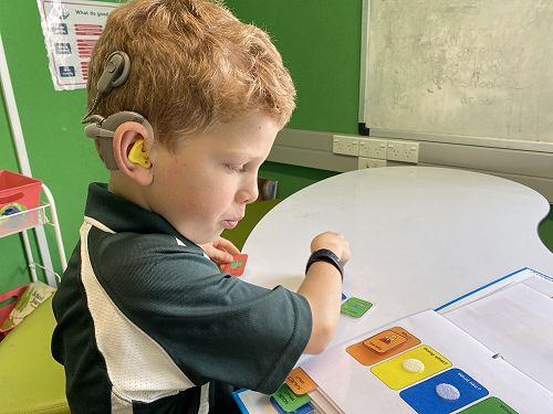 Jack engaging with Colourful Semantics.