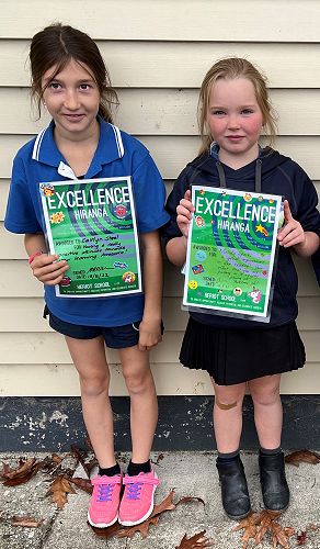 Cousins Caitlyn Steel and Melody Sparks from Heriot School upholding the school value of hiranga -excellence