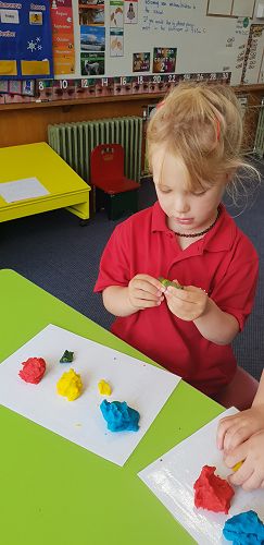 Mixing colours with playdough